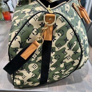 Limited edition Louis Vuitton
Monogram Camouflage 
Takashi Murakami
Used only 2x